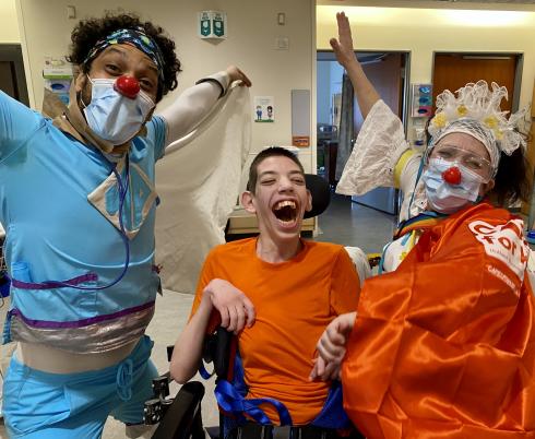 Matthew laughing with the therapeutic clowns. 