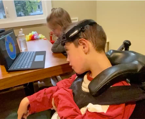 Kids in Alberta's clinic playing Sumo Bootle. 