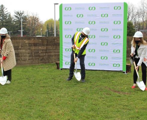 Hospital CEO Julia Hanigsberg poses with VP of Research Tom Chau and Foundation CEO Sandra Hawken for a shovel-in-the-ground photo on the site where the hospital's two-storey addition will be built this month.