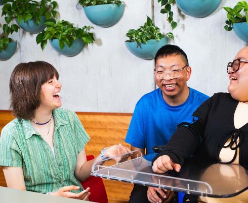 Three people chatting