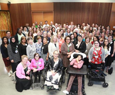 A big group of people in an indoor setting.
