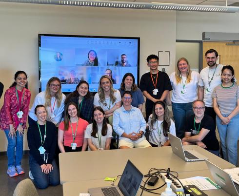 group of clinicians in a room smiling