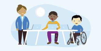 3 people are positioned behind a desk. One person is standing and 2 people are seated, everyone has an open laptop in front of them.
